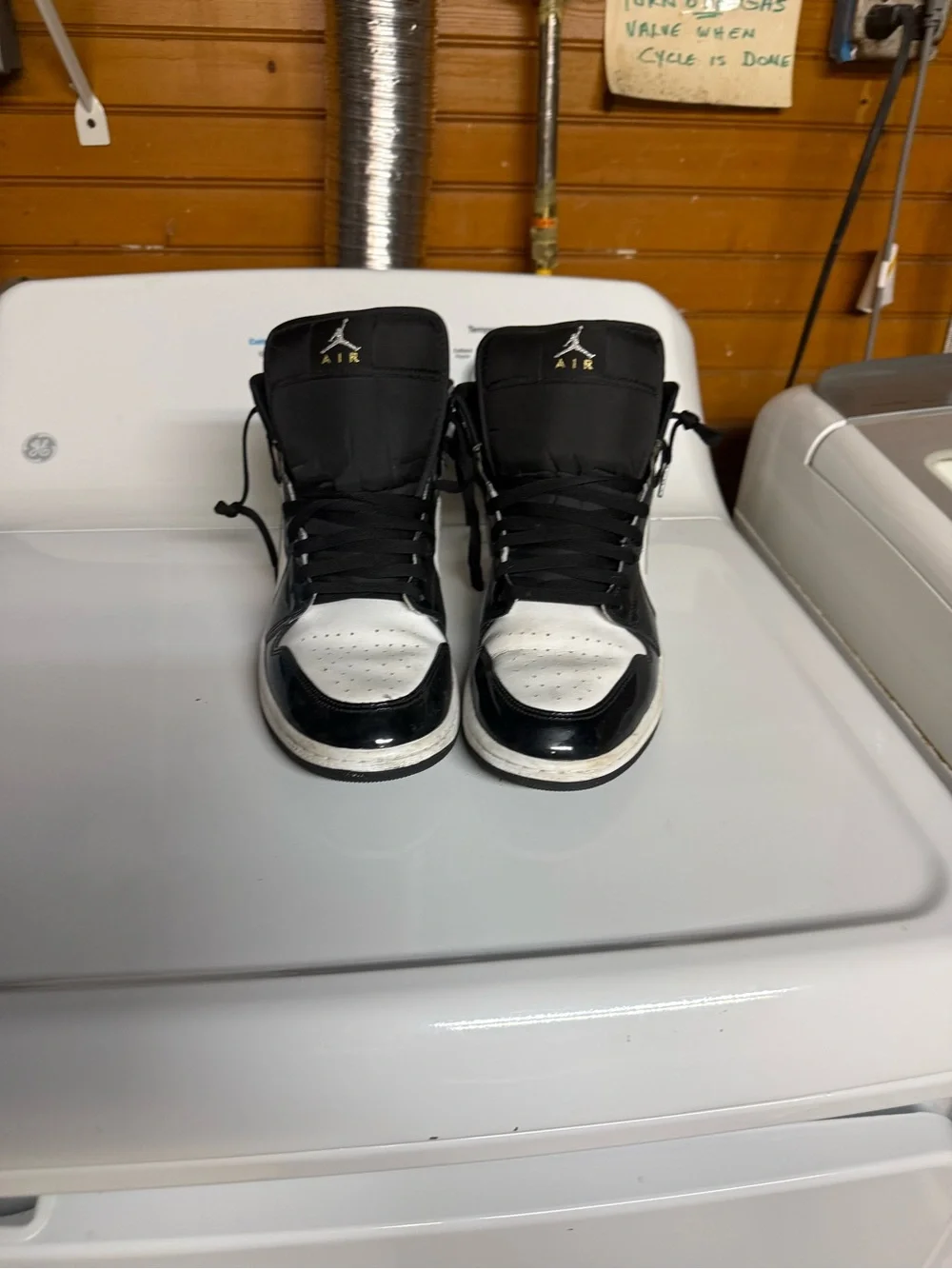 Jordan Black and White Patent Leather High-Top Sneakers